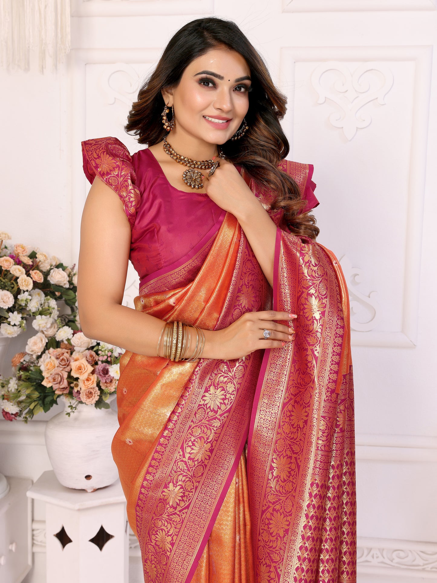 Orange Eshwari Banarasi tissue silk sarees with all over Butti contrast woven borders classic pallu
