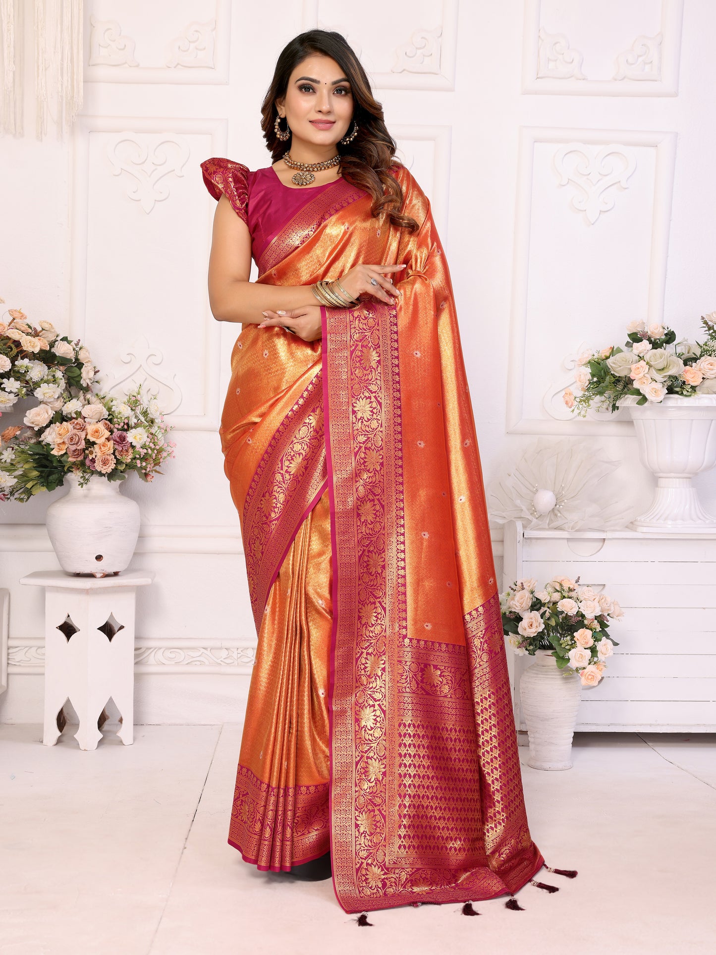 Orange Eshwari Banarasi tissue silk sarees with all over Butti contrast woven borders classic pallu