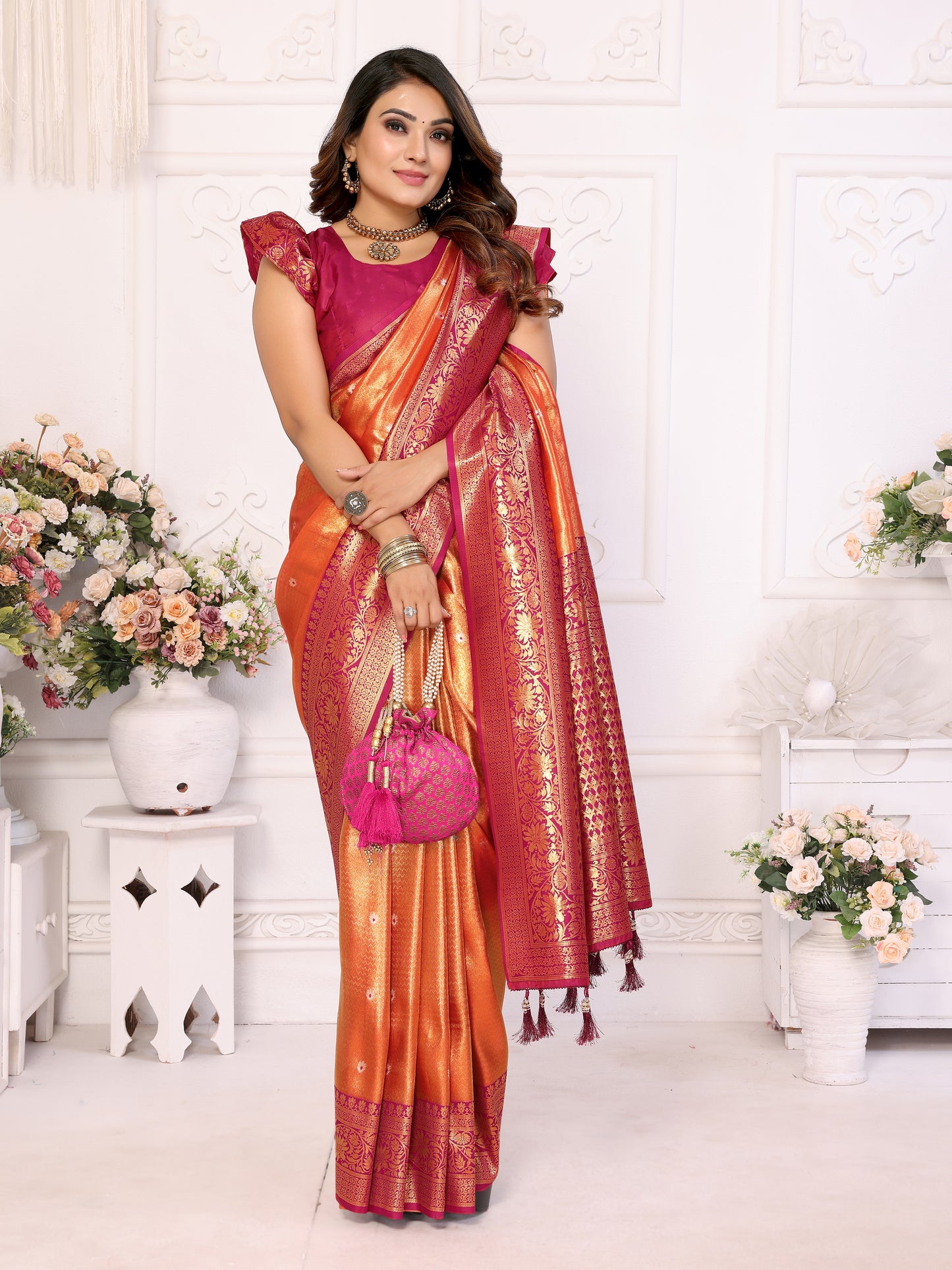 Orange Eshwari Banarasi tissue silk sarees with all over Butti contrast woven borders classic pallu