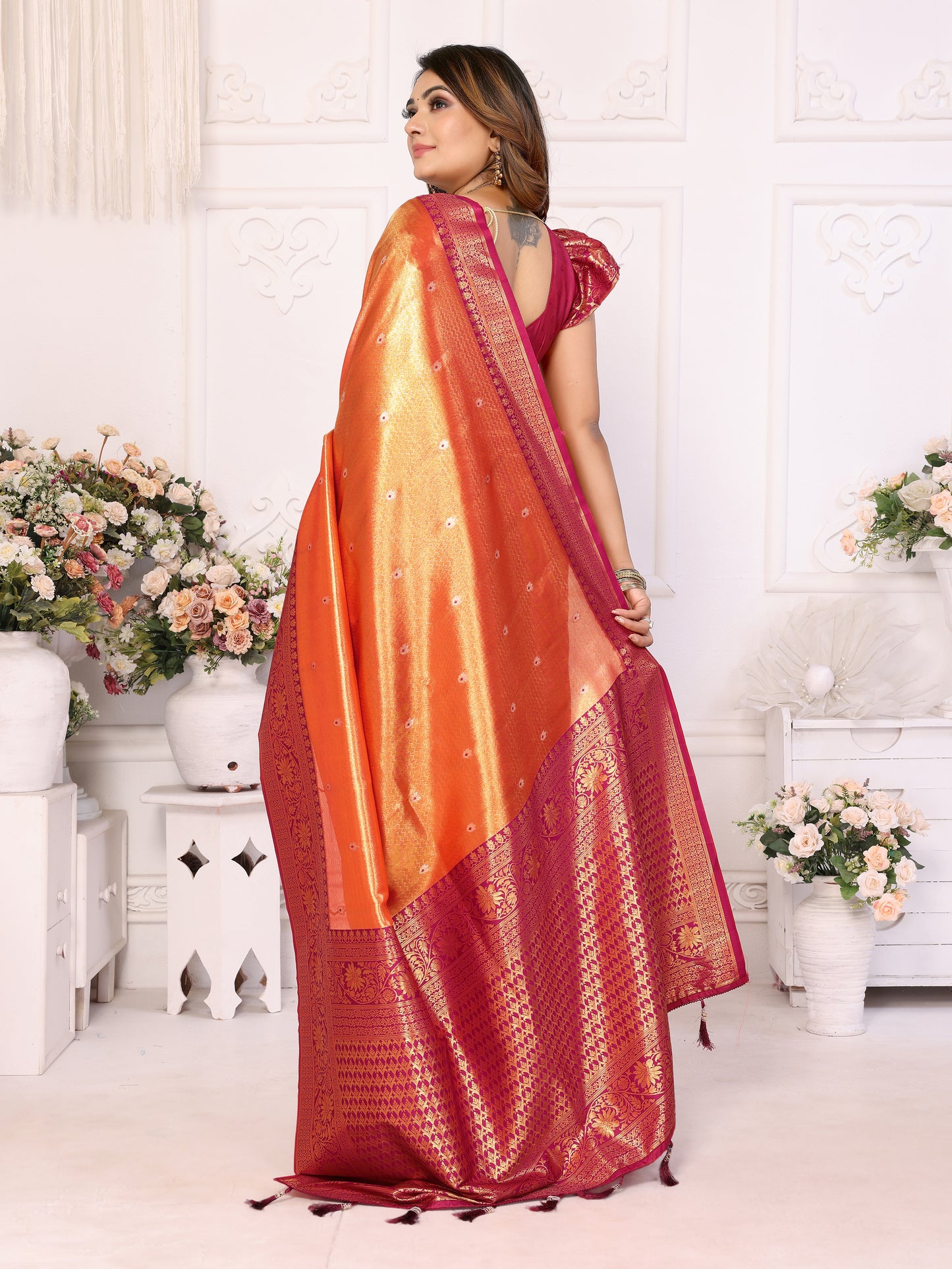 Orange Eshwari Banarasi tissue silk sarees with all over Butti contrast woven borders classic pallu