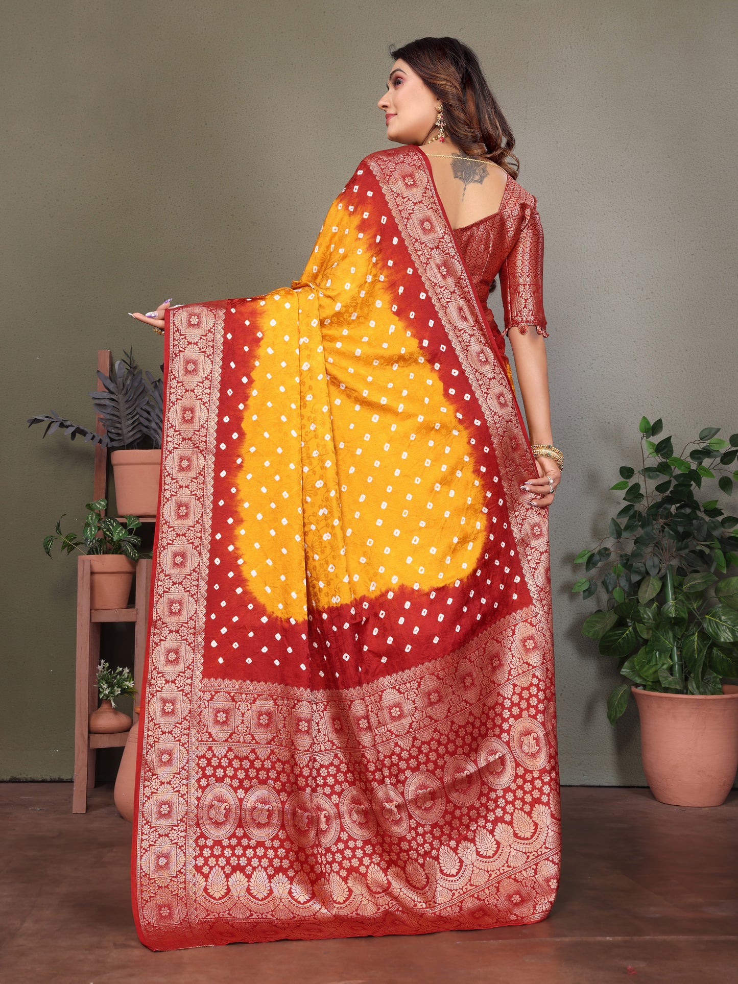 Yellow Satyavati Bandhej Satin Silk Saree Made By Original Bandhej With Zari Weaving Border