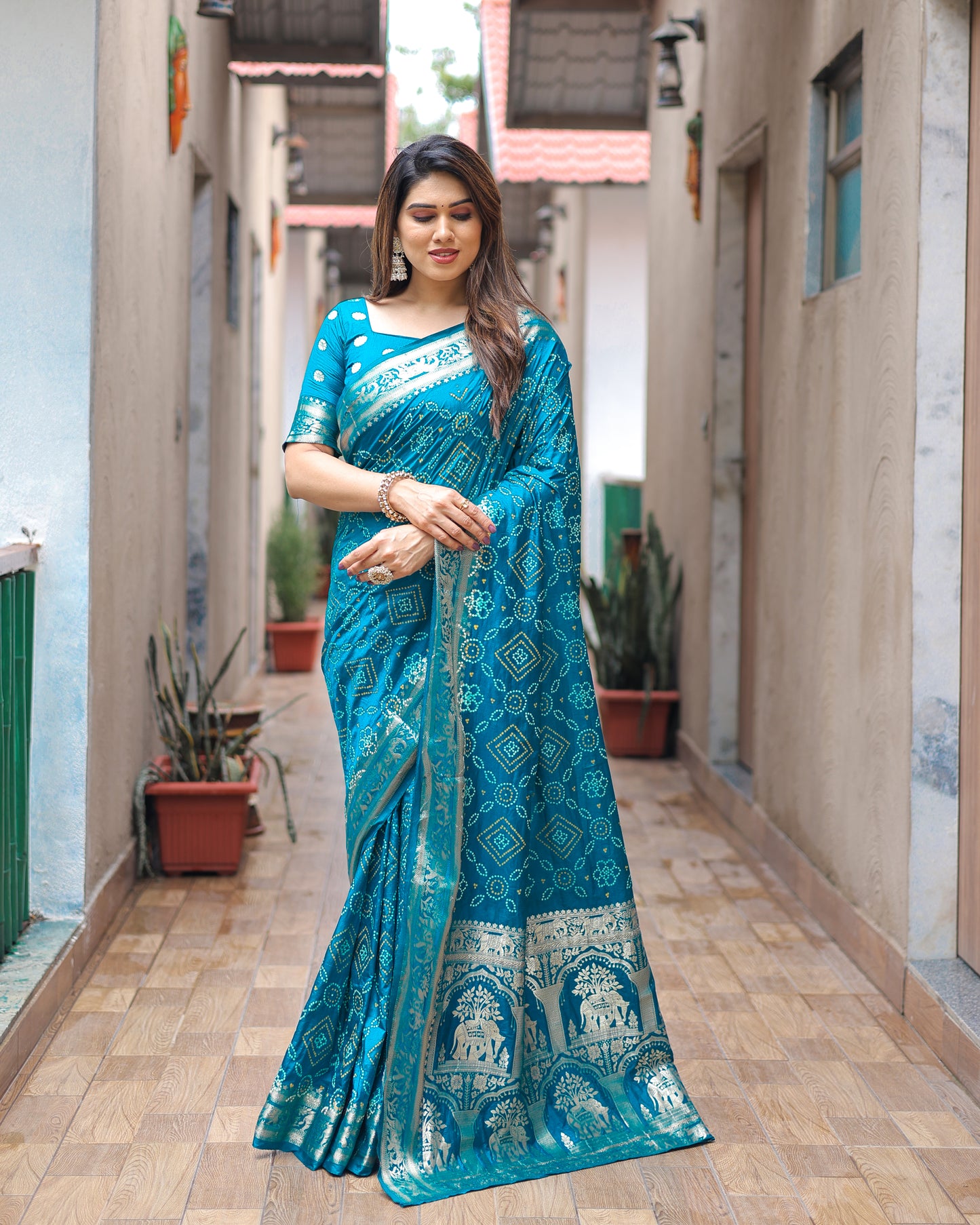 Sky Pushpavati Soft Dola Silk Bandhej Sarees With Kanchi Weaving Border With Multicolour Bandhej Block Print Design