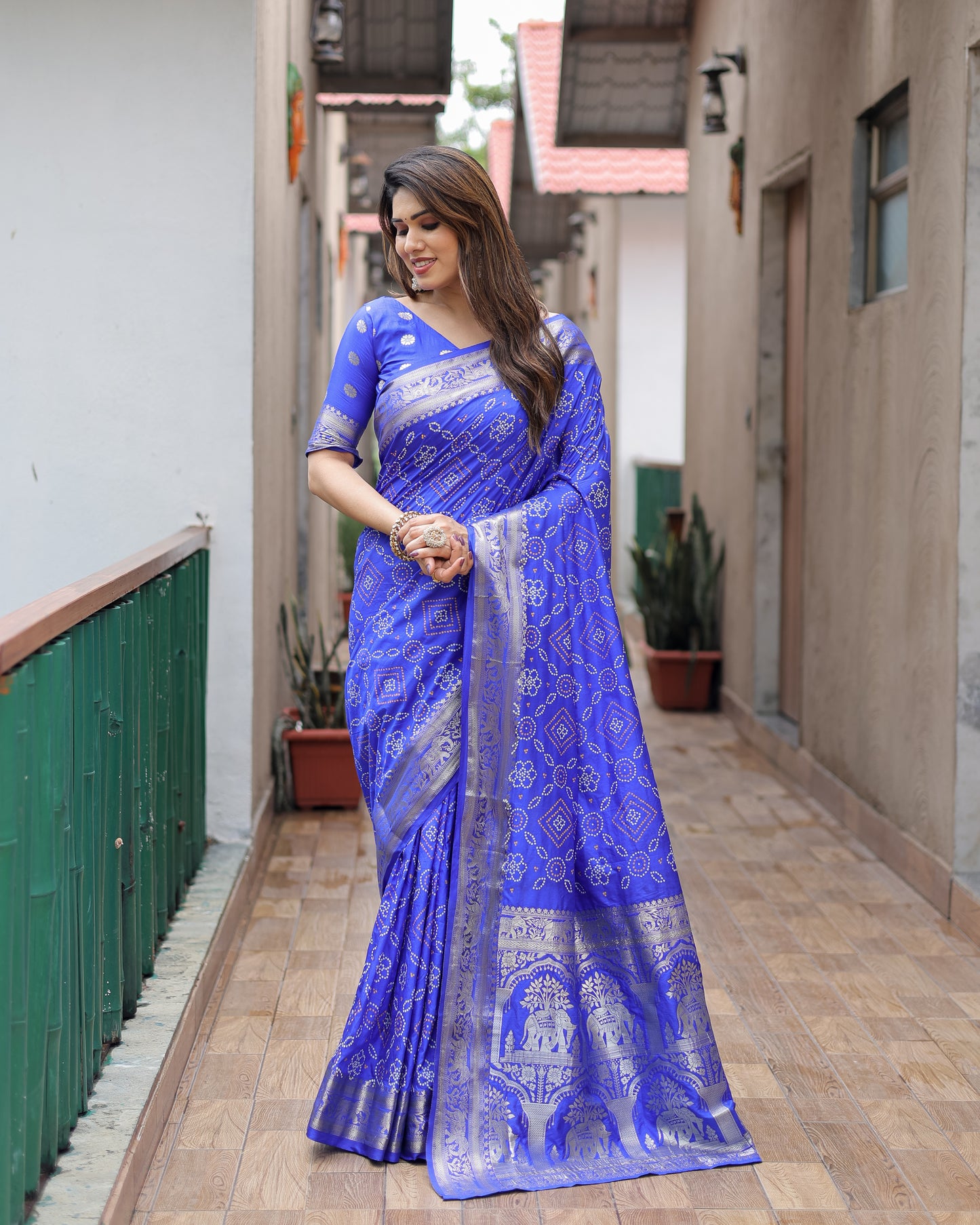 Blue Pushpavati Soft Dola Silk Bandhej Sarees With Kanchi Weaving Border With Multicolour Bandhej Block Print Design
