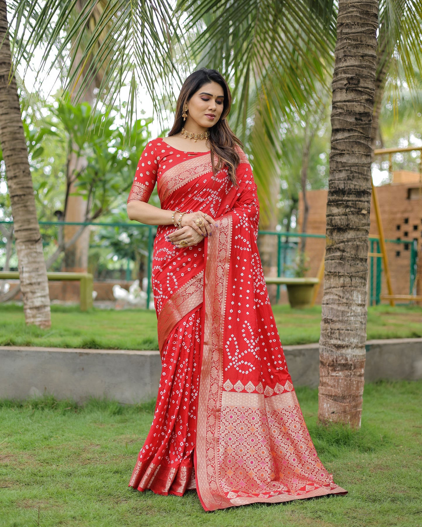 Red Padmavati Dola Soft Silk Bandhej Saree With All Over Handmade Bandhej With Jari Weaving Border