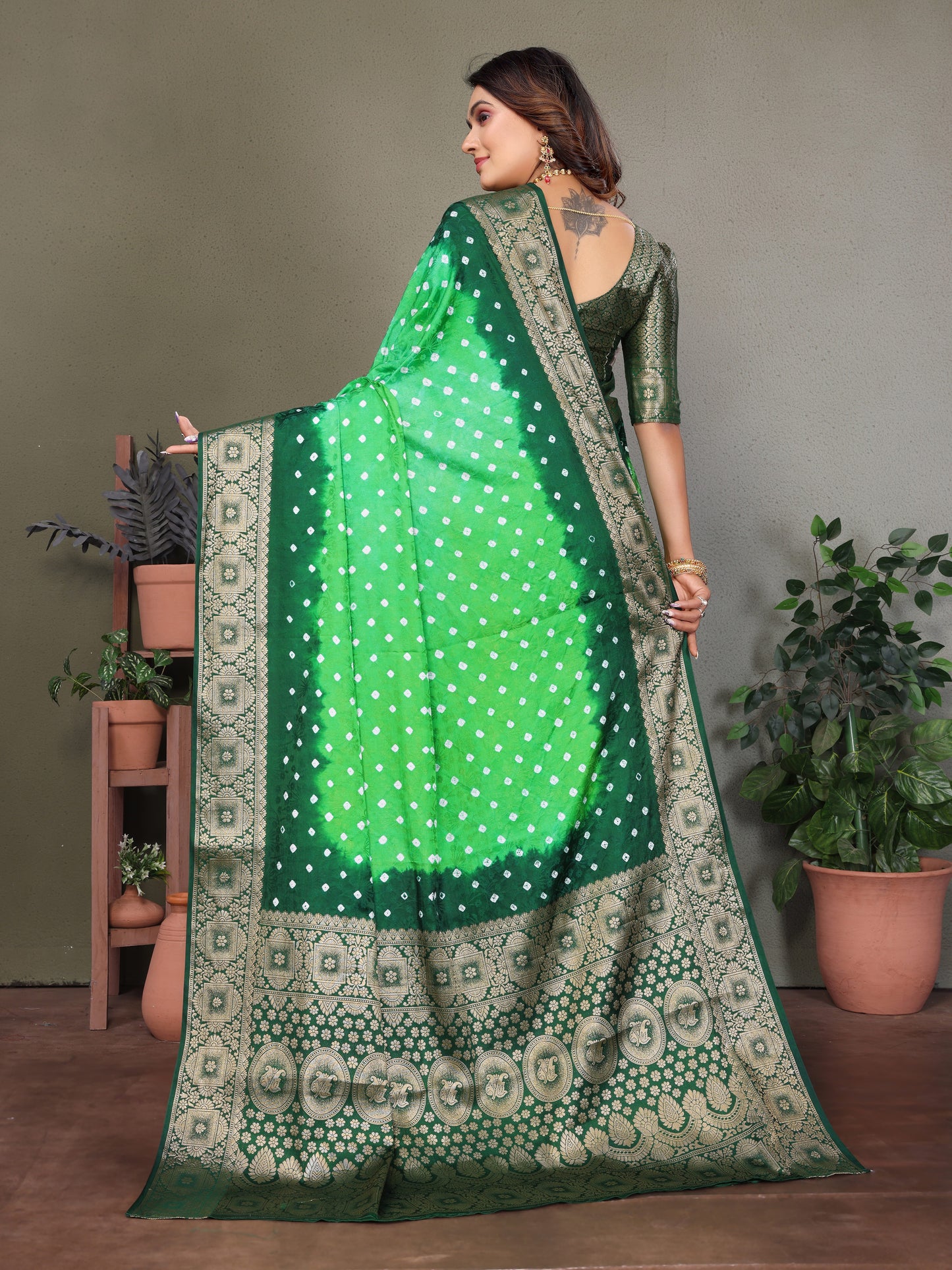 Light Green Satyavati Bandhej Satin Silk Saree Made By Original Bandhej With Zari Weaving Border