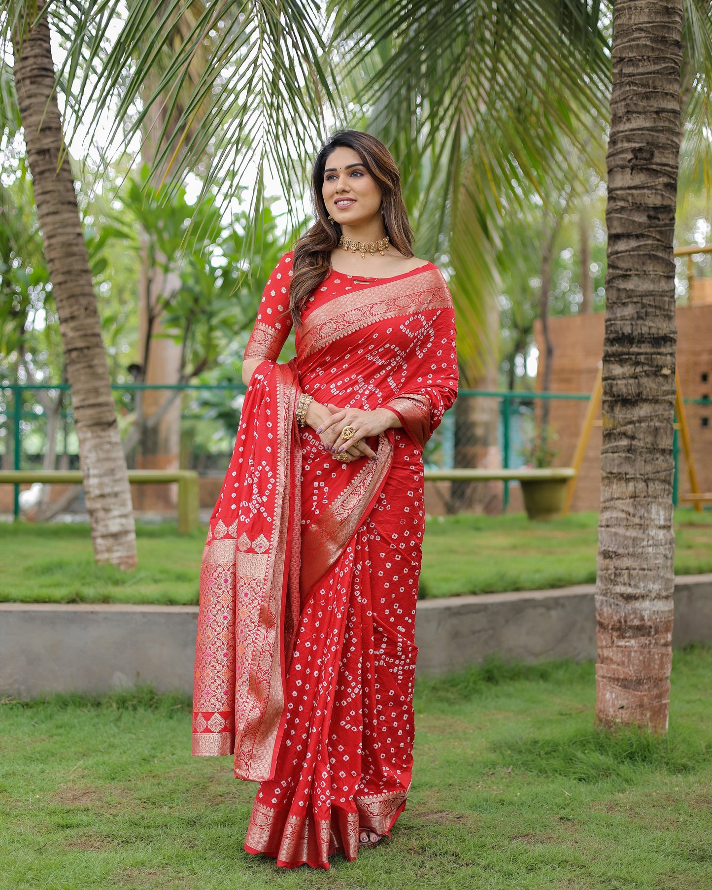 Red Padmavati Dola Soft Silk Bandhej Saree With All Over Handmade Bandhej With Jari Weaving Border