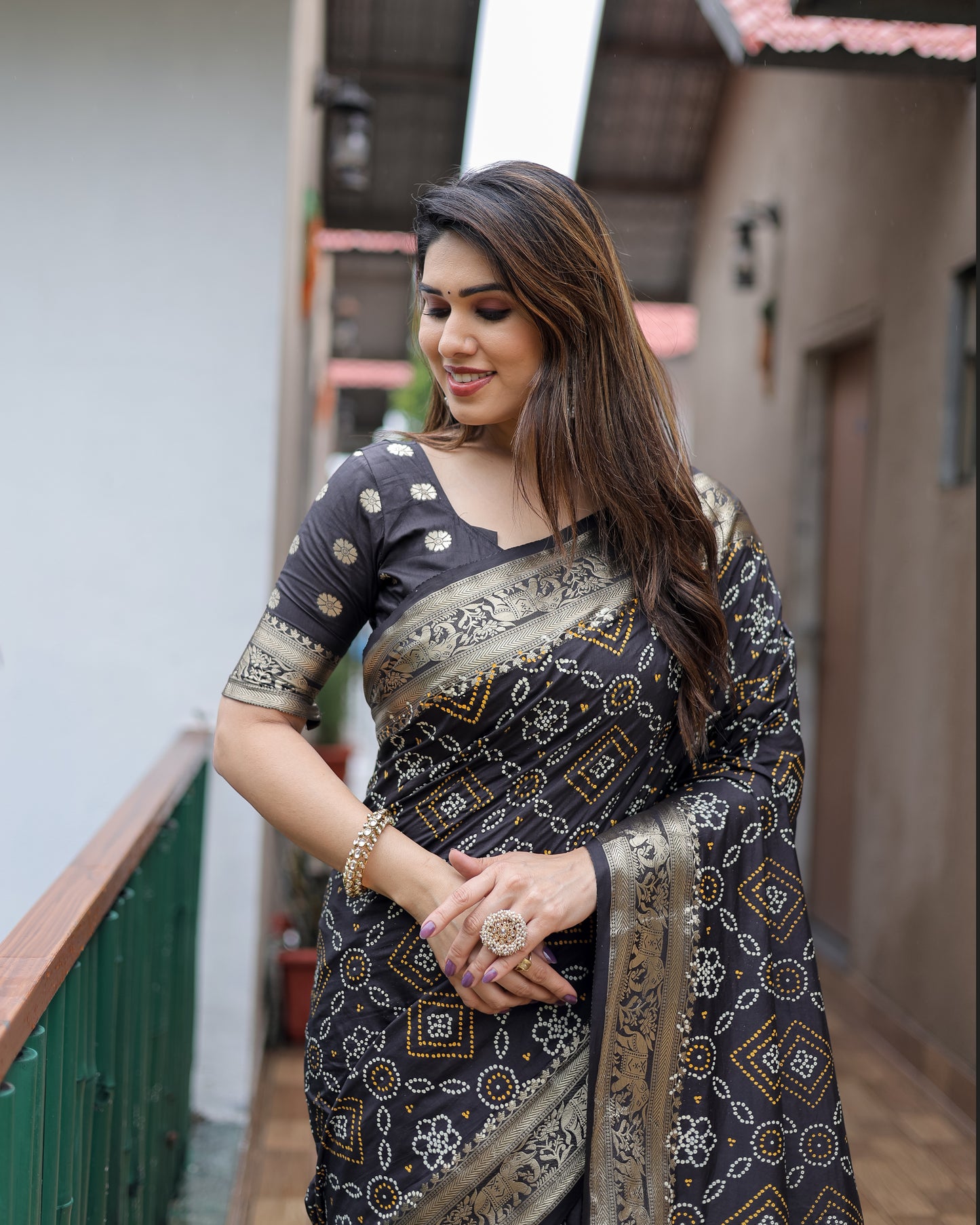 Black Pushpavati Soft Dola Silk Bandhej Sarees With Kanchi Weaving Border With Multicolour Bandhej Block Print Design