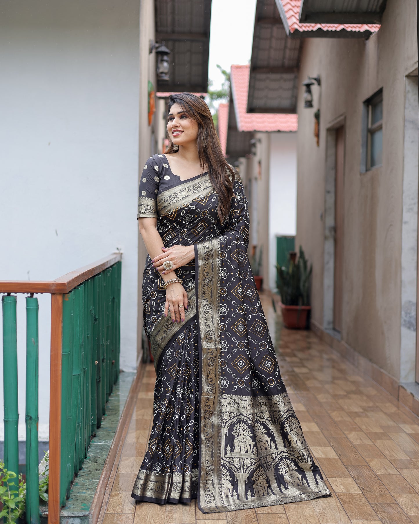 Black Pushpavati Soft Dola Silk Bandhej Sarees With Kanchi Weaving Border With Multicolour Bandhej Block Print Design