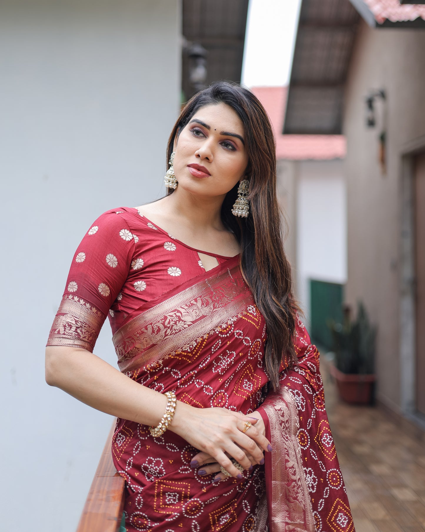 Maroon Pushpavati Soft Dola Silk Bandhej Sarees With Kanchi Weaving Border With Multicolour Bandhej Block Print Design