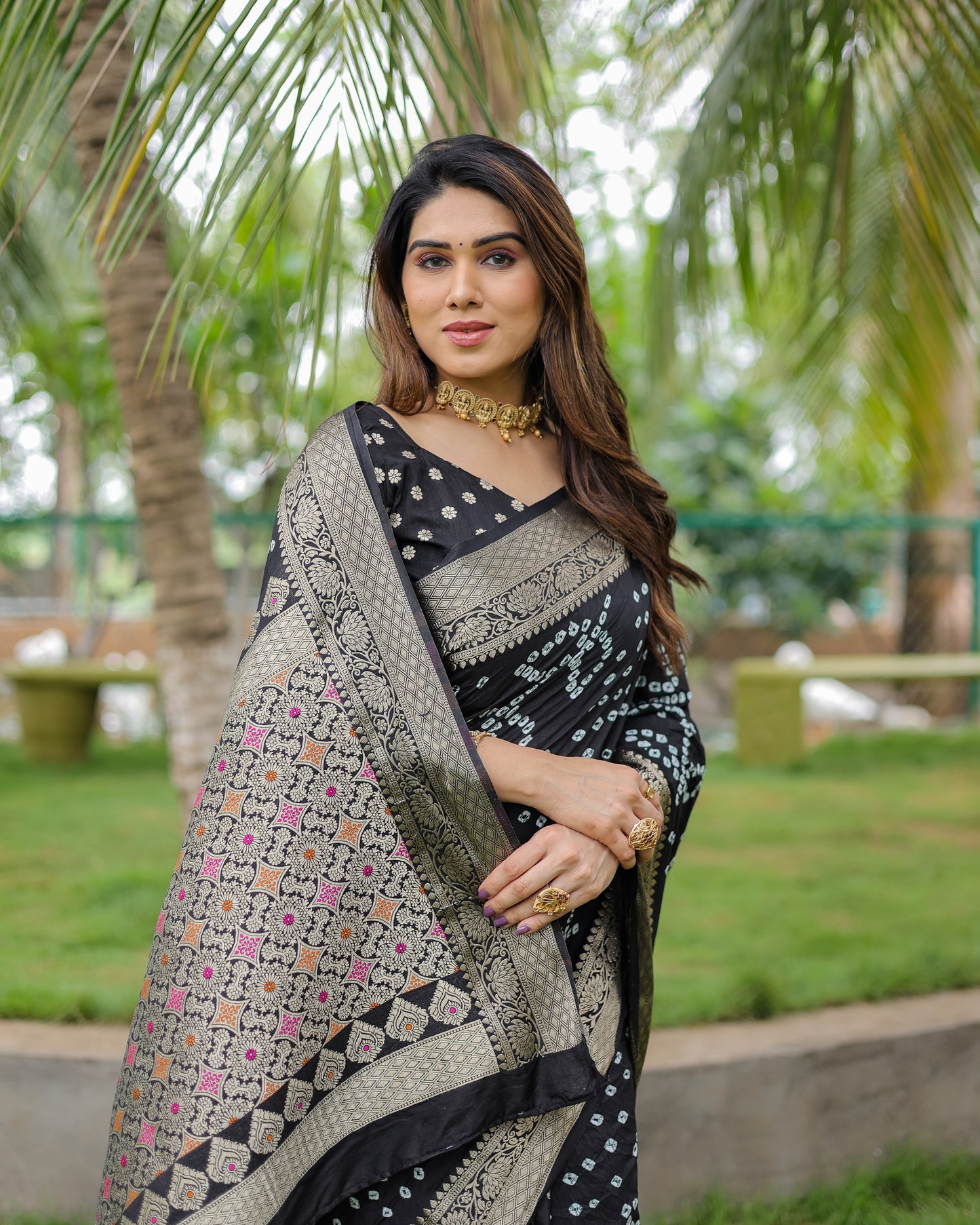 Black Padmavati Dola Soft Silk Bandhej Saree With All Over Handmade Bandhej With Jari Weaving Border