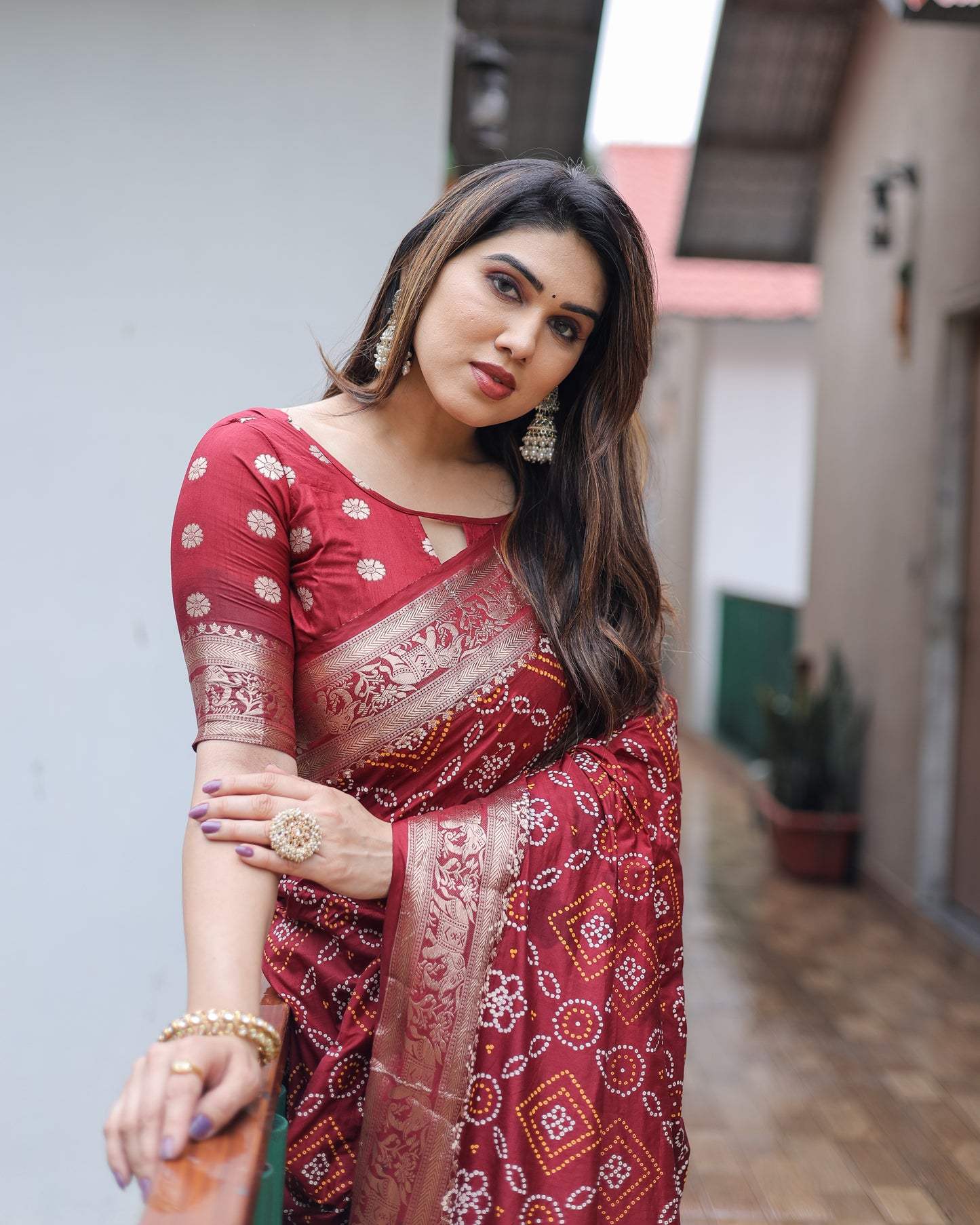 Maroon Pushpavati Soft Dola Silk Bandhej Sarees With Kanchi Weaving Border With Multicolour Bandhej Block Print Design