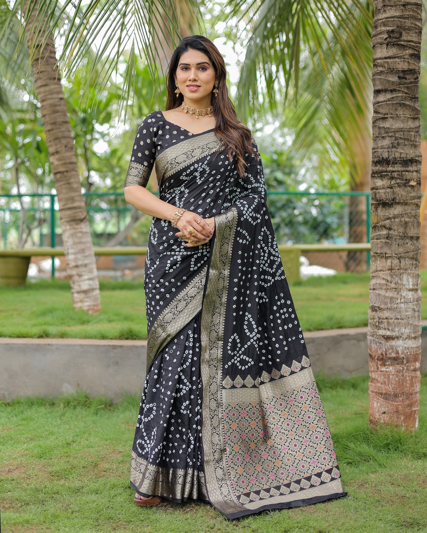 Black Padmavati Dola Soft Silk Bandhej Saree With All Over Handmade Bandhej With Jari Weaving Border