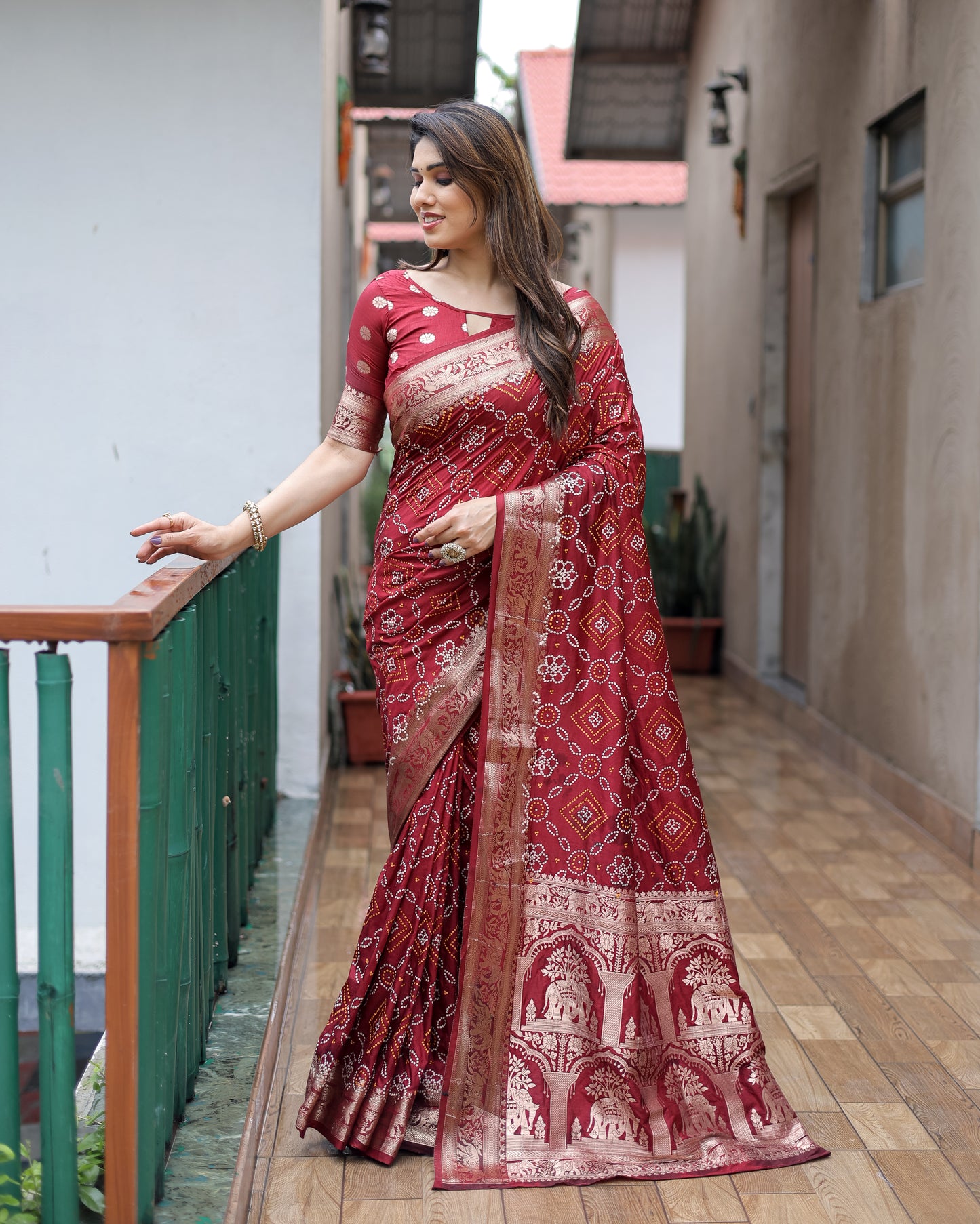Maroon Pushpavati Soft Dola Silk Bandhej Sarees With Kanchi Weaving Border With Multicolour Bandhej Block Print Design