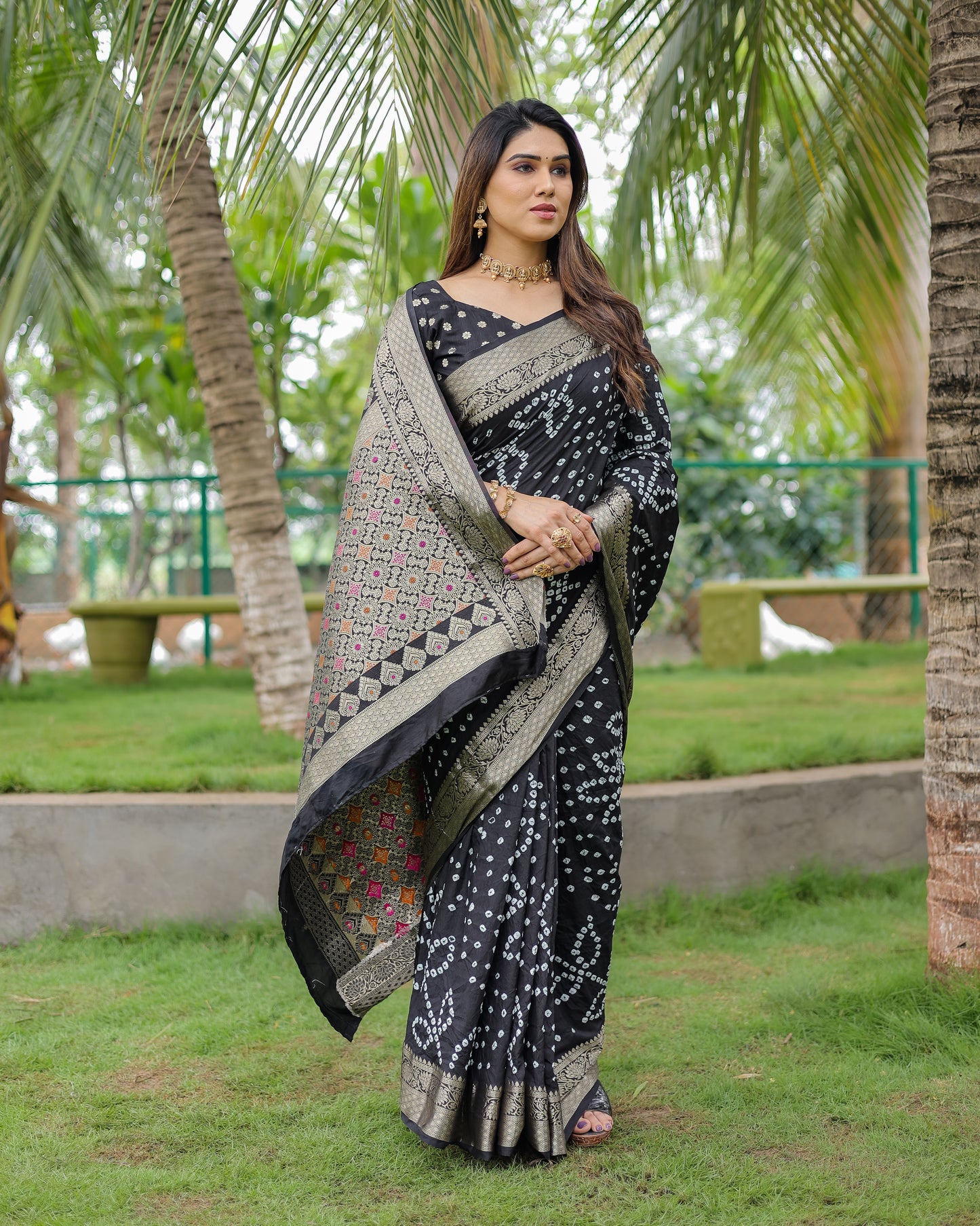 Black Padmavati Dola Soft Silk Bandhej Saree With All Over Handmade Bandhej With Jari Weaving Border