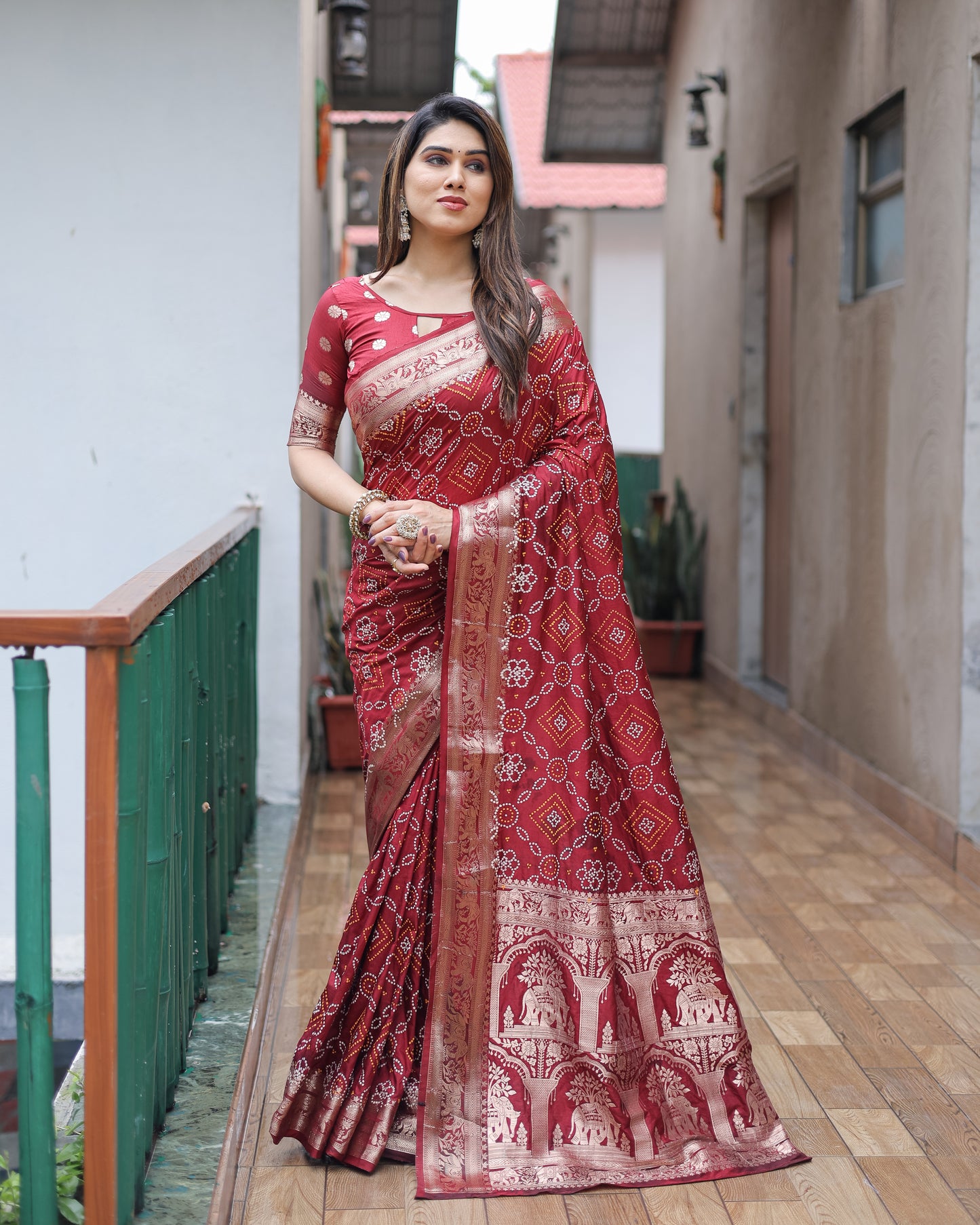 Maroon Pushpavati Soft Dola Silk Bandhej Sarees With Kanchi Weaving Border With Multicolour Bandhej Block Print Design