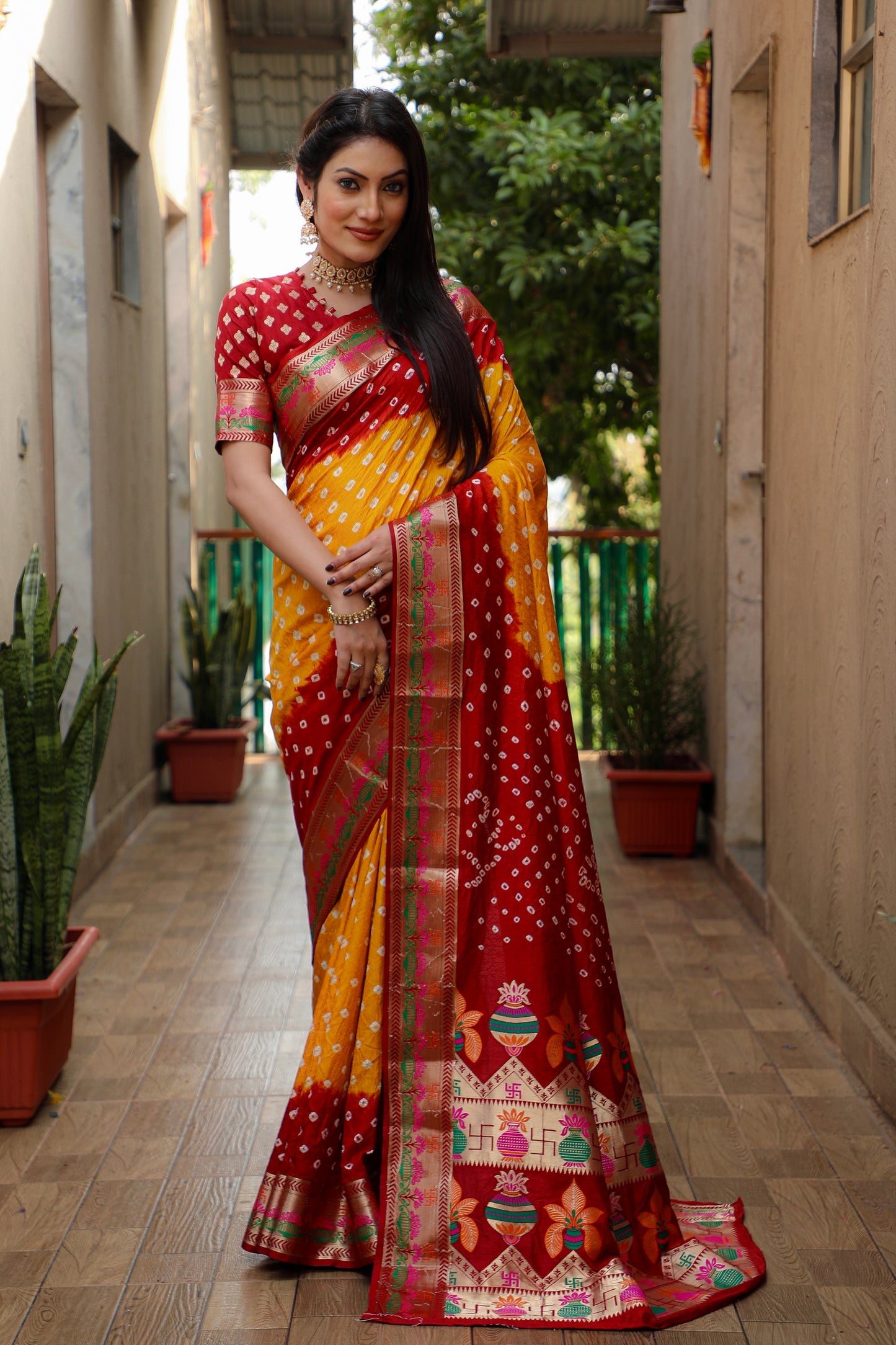 Orange Swastik Pure Bandhej Silk Saree With Minakari Border Kalash & Swastik Design Rich Pallu Saree