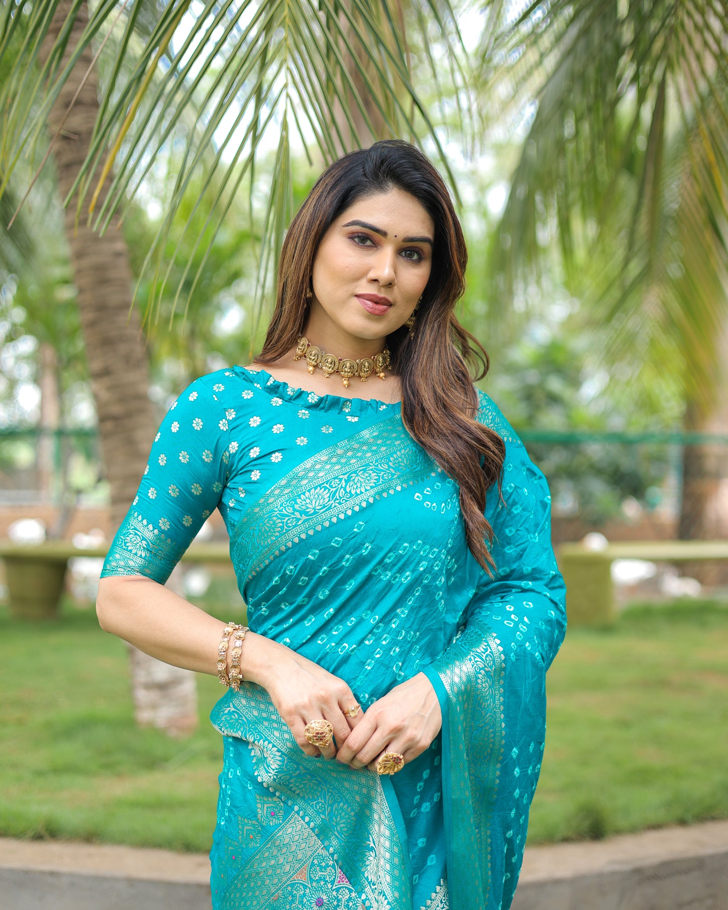 Sky Padmavati Dola Soft Silk Bandhej Saree With All Over Handmade Bandhej With Jari Weaving Border