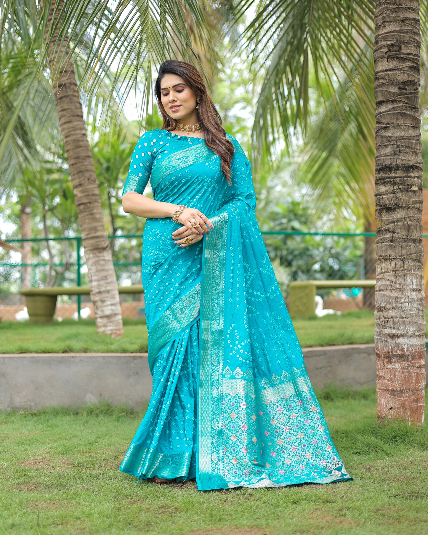 Sky Padmavati Dola Soft Silk Bandhej Saree With All Over Handmade Bandhej With Jari Weaving Border