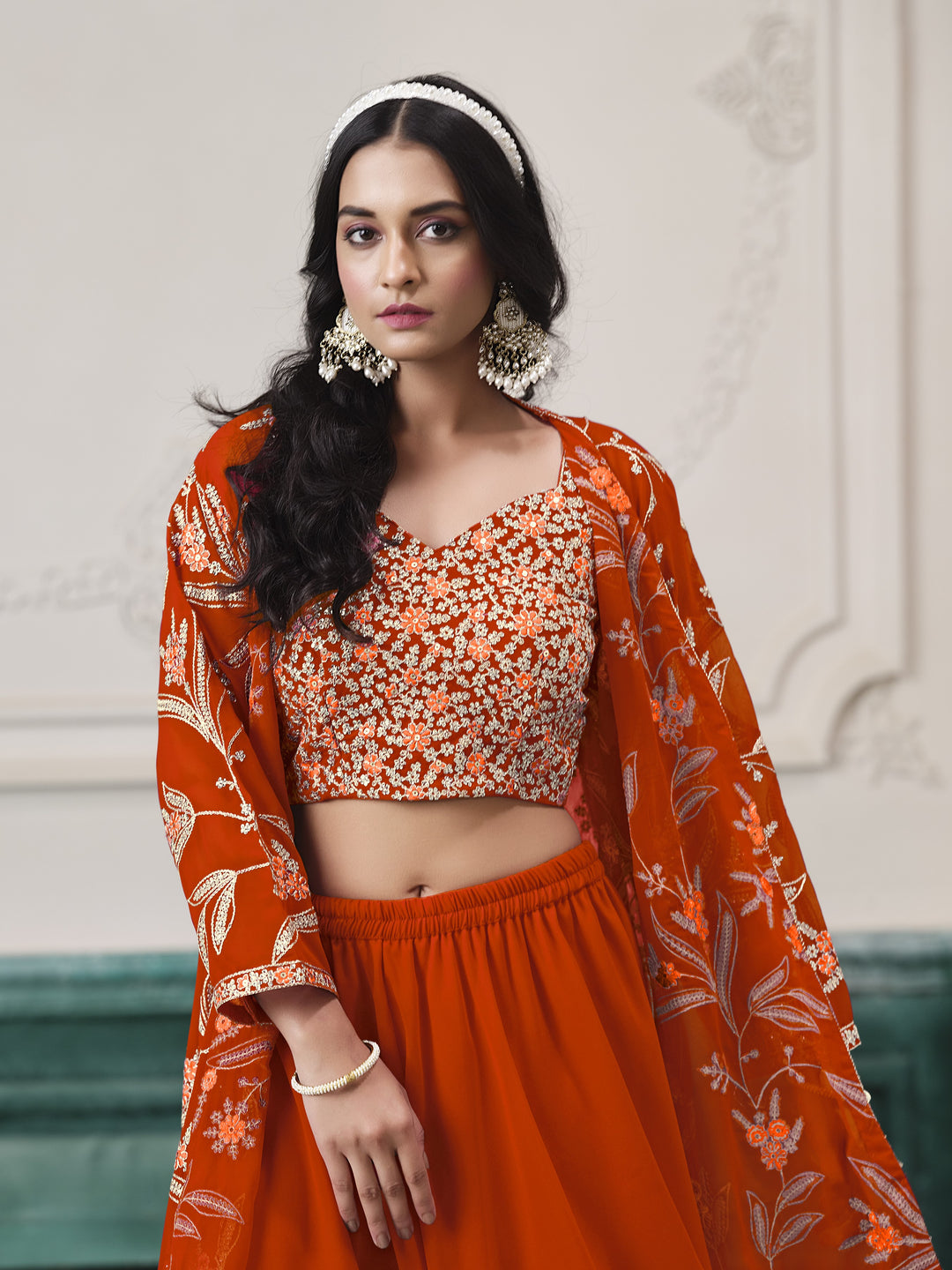 Orange Color Faux Georgette With Embroidery And Sequins Work Top And Sharara