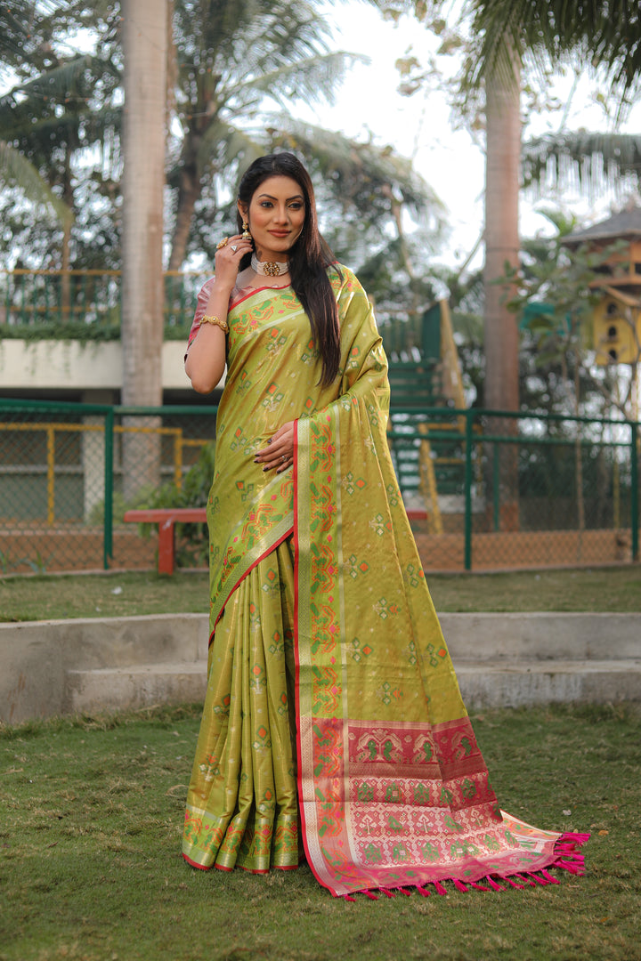 Mehndi-green Isha Organza Silk Sarees Ikkat Patola concept With Ikkat Patola weave pallu with tassels
