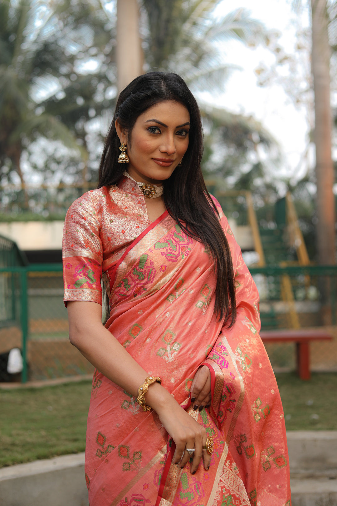 Peach Isha Organza Silk Sarees Ikkat Patola concept With Ikkat Patola weave pallu with tassels