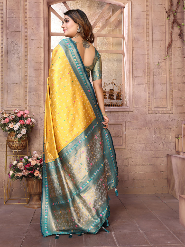 Yellow Tarveni Banarasi Tissue Silk (Patola weaving) Saree With Contrast Patola Woven Borders & Pallu