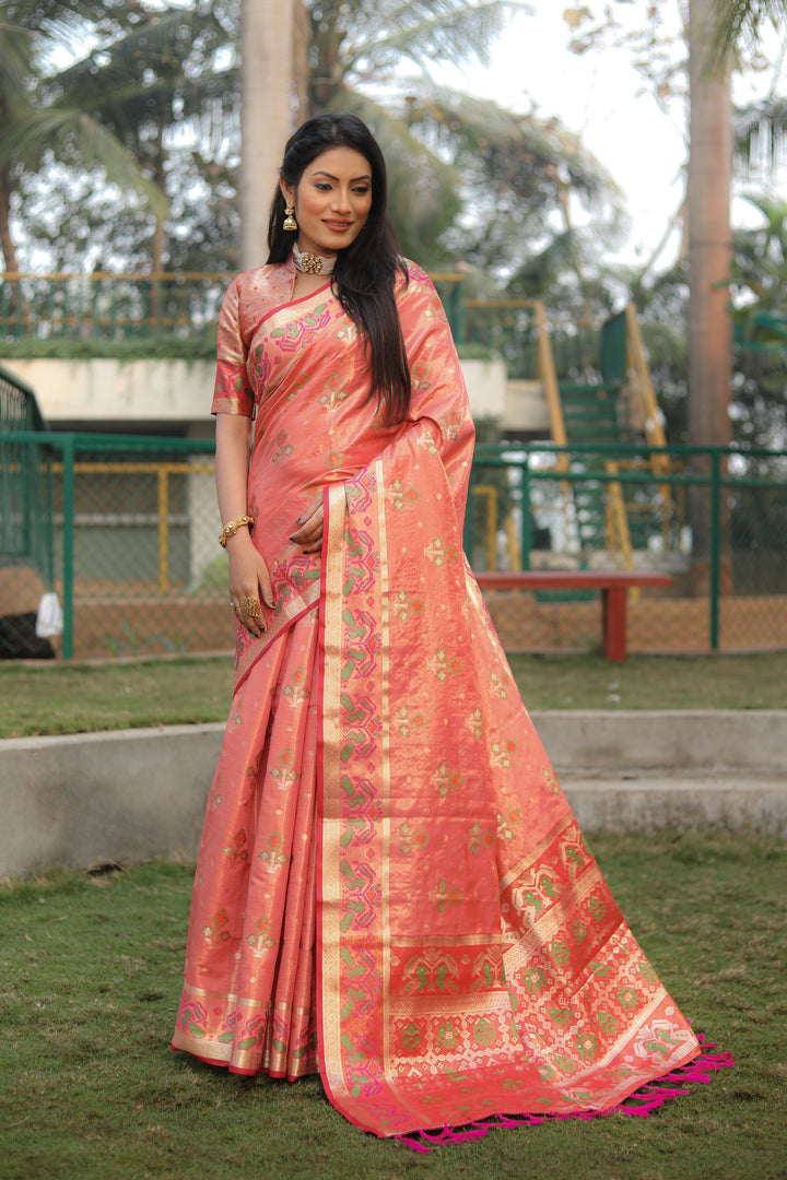 Peach Isha Organza Silk Sarees Ikkat Patola concept With Ikkat Patola weave pallu with tassels