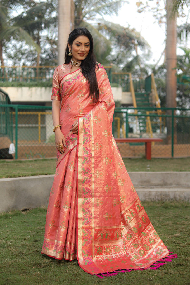 Peach Isha Organza Silk Sarees Ikkat Patola concept With Ikkat Patola weave pallu with tassels