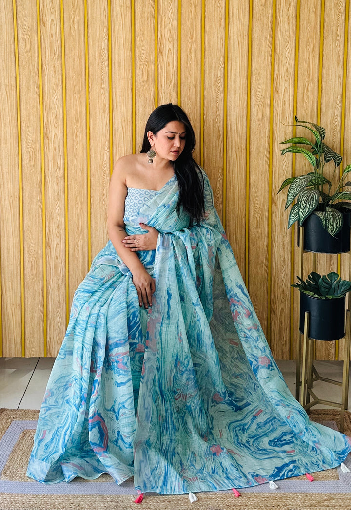 Sky Blue Aashvi Soft Linen Cotton Digital Print Sarees With Batik Print With Silver Border