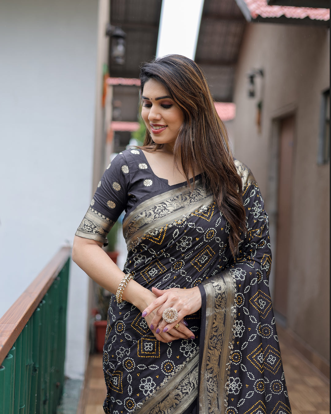Black Pushpavati Soft Dola Silk Bandhej Sarees With Kanchi Weaving Border With Multicolour Bandhej Block Print Design