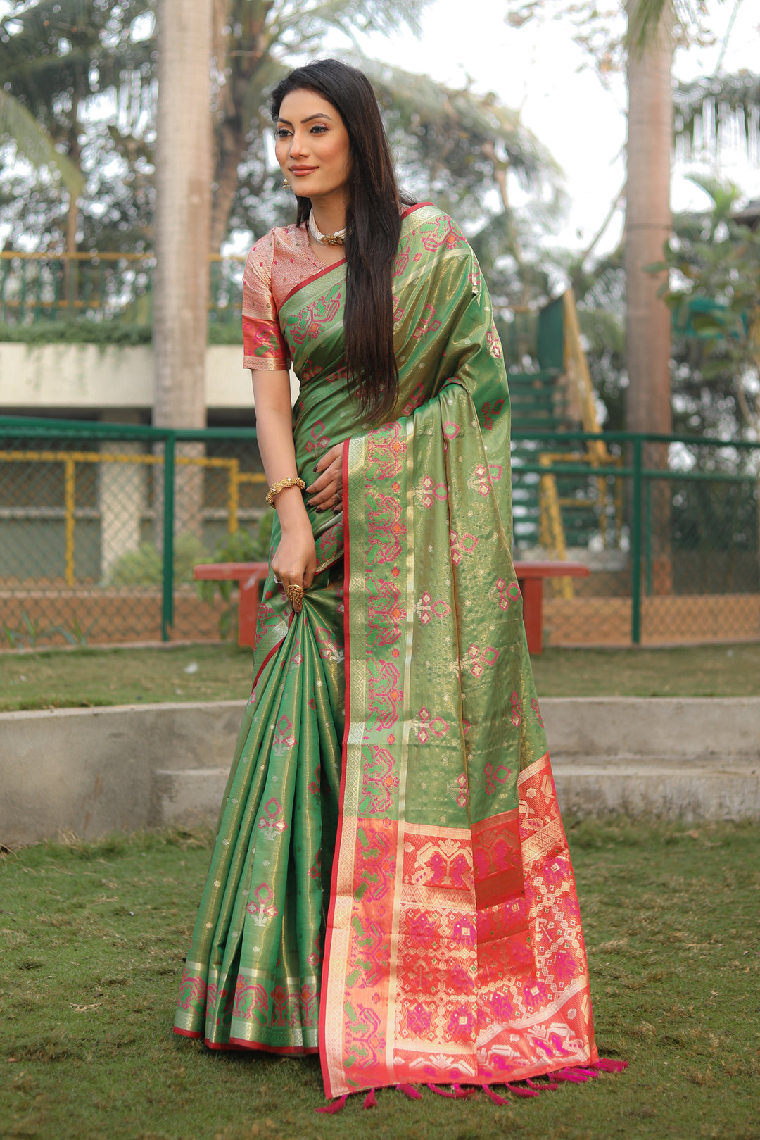 Green Isha Organza Silk Sarees Ikkat Patola concept With Ikkat Patola weave pallu with tassels