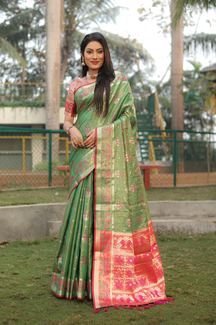 Green Isha Organza Silk Sarees Ikkat Patola concept With Ikkat Patola weave pallu with tassels