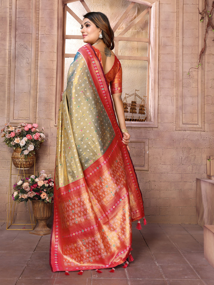 Rama-Green Tarveni Banarasi Tissue Silk (Patola weaving) Saree With Contrast Patola Woven Borders & Pallu