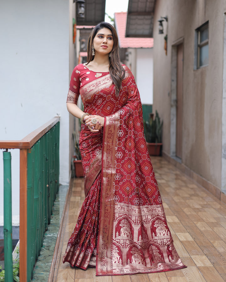 Maroon Pushpavati Soft Dola Silk Bandhej Sarees With Kanchi Weaving Border With Multicolour Bandhej Block Print Design