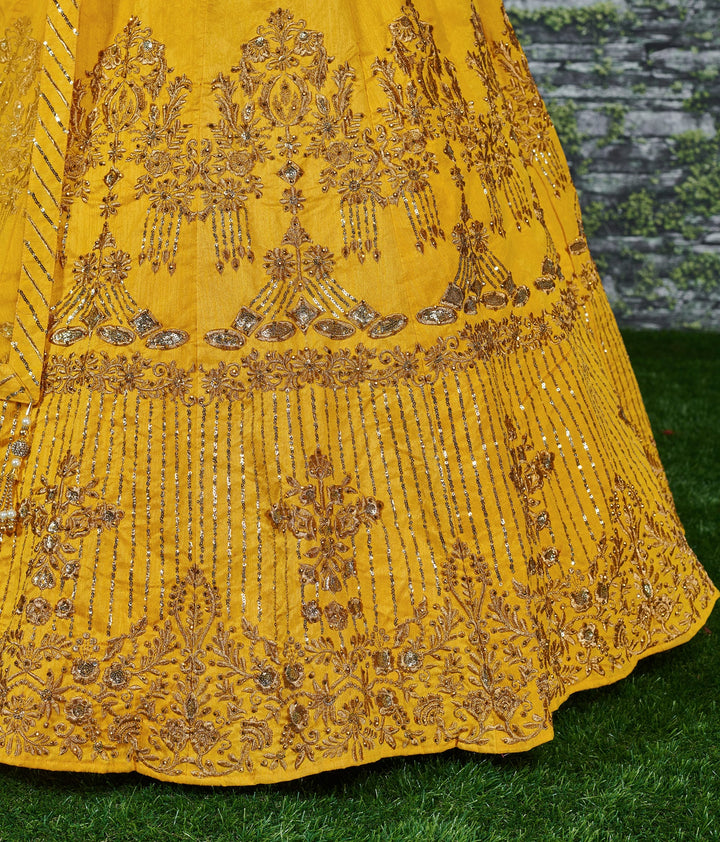 Yellow Color Banglory Silk Stone with Zari and Sequins Embroiderey Lehenga Choli