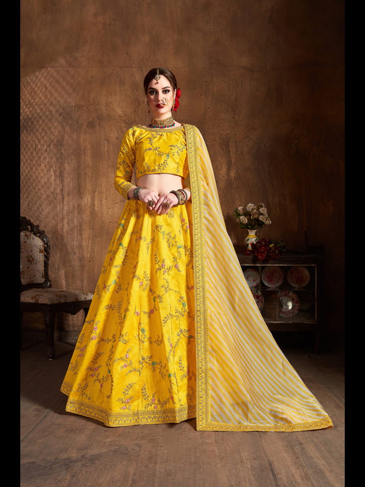 Yellow color Mulberry Silk Zari, Sequins and Embroidery Work Lehenga Choli