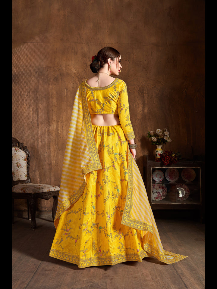 Yellow color Mulberry Silk Zari, Sequins and Embroidery Work Lehenga Choli