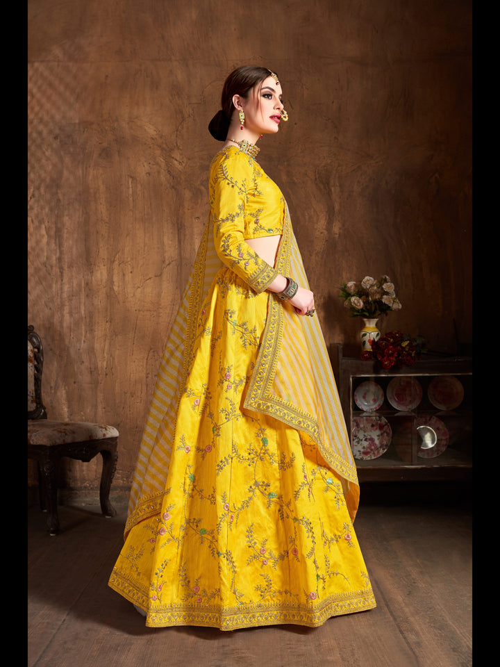 Yellow color Mulberry Silk Zari, Sequins and Embroidery Work Lehenga Choli