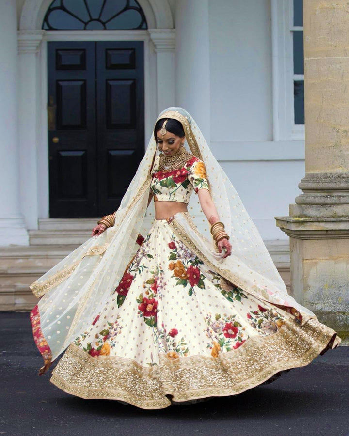Cream Color Art Silk Sequins Embroidered Border and Pearl work Lehenga Choli
