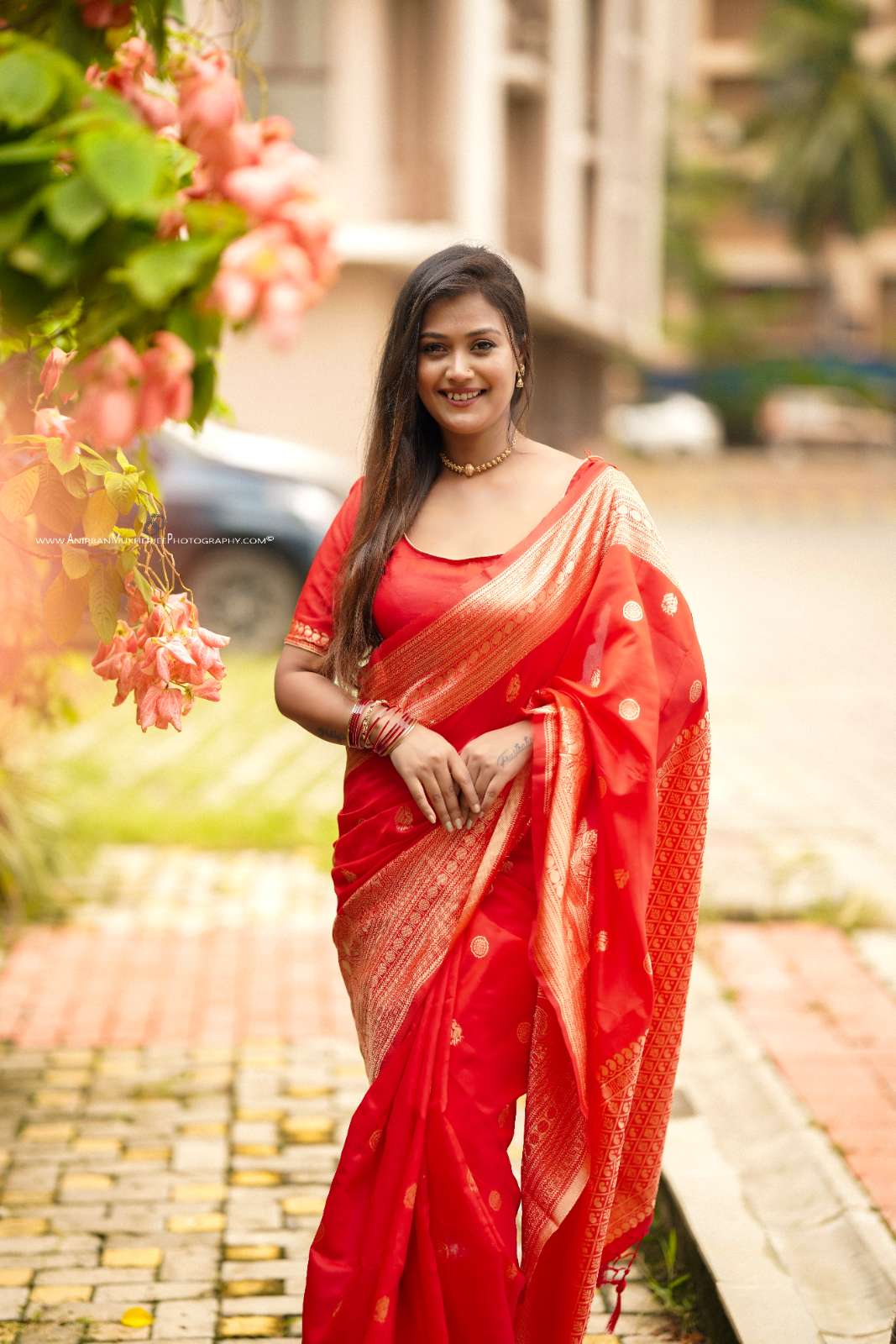 Red Color Polka Print Jacquard Banarasi Saree with Border and Tussel