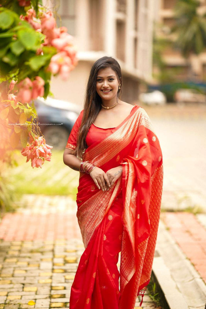 Red Color Polka Print Jacquard Banarasi Saree with Border and Tussel