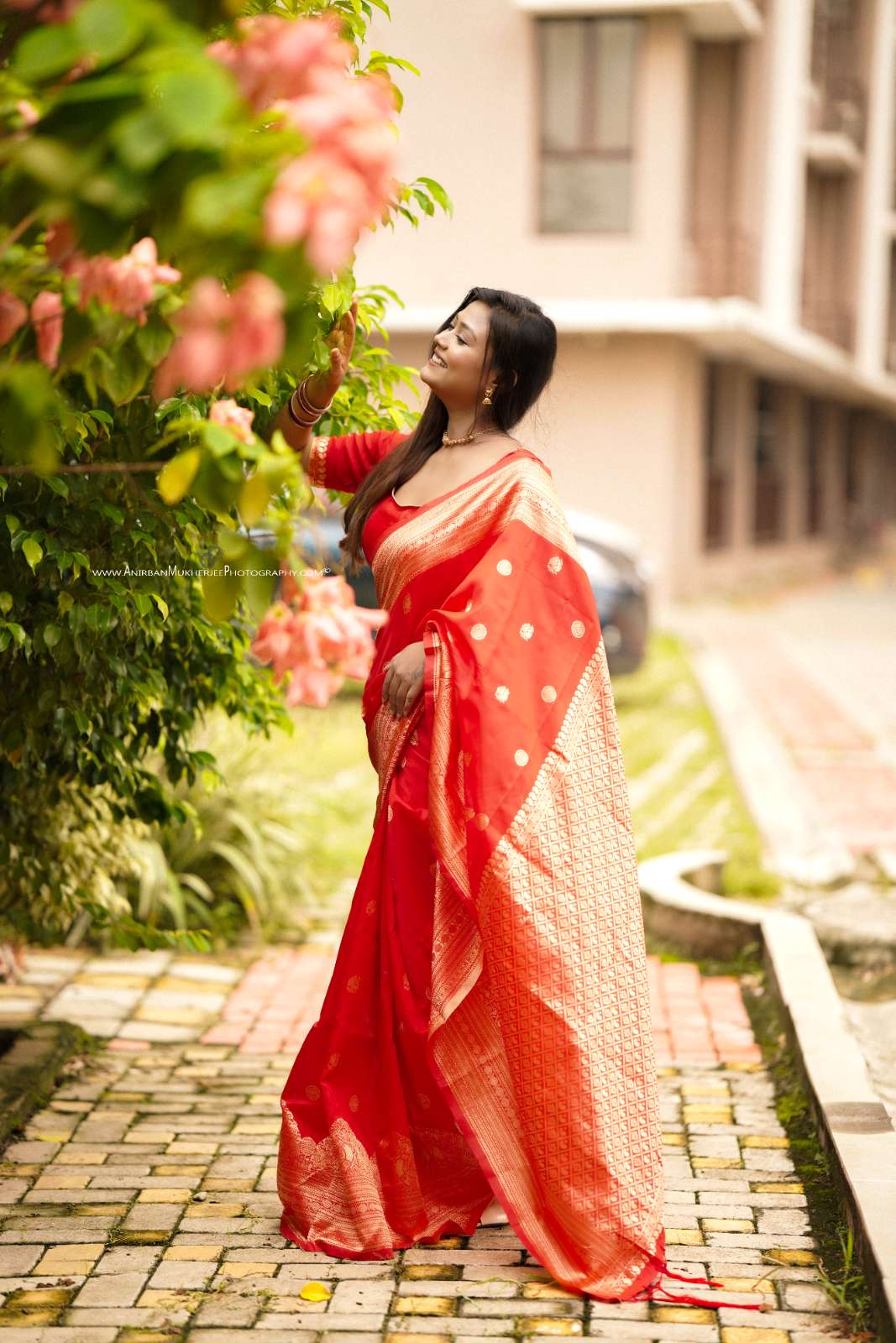 Red Color Polka Print Jacquard Banarasi Saree with Border and Tussel