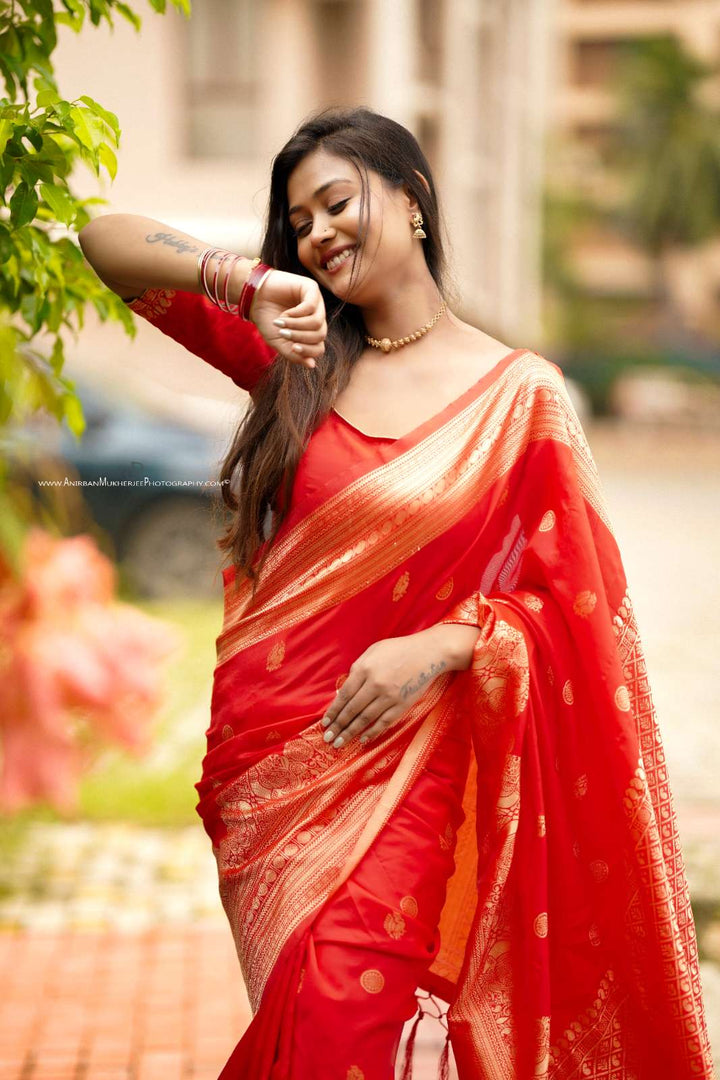 Red Color Polka Print Jacquard Banarasi Saree with Border and Tussel
