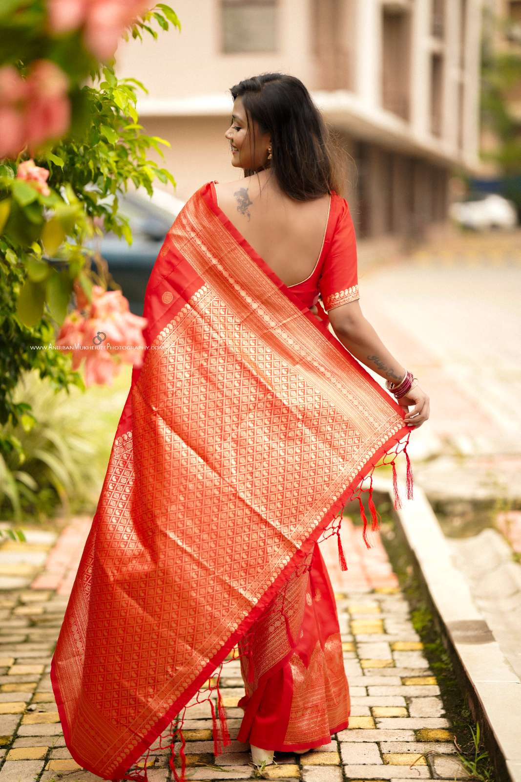 Red Color Polka Print Jacquard Banarasi Saree with Border and Tussel