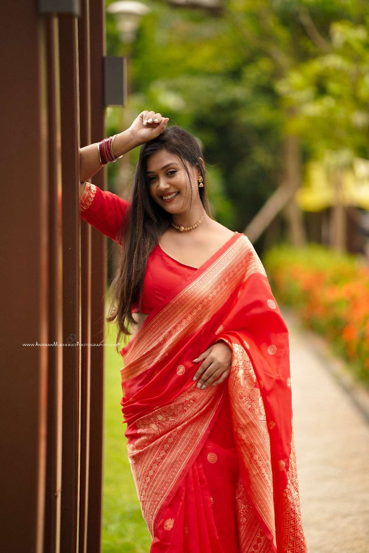 Red Color Polka Print Jacquard Banarasi Saree with Border and Tussel