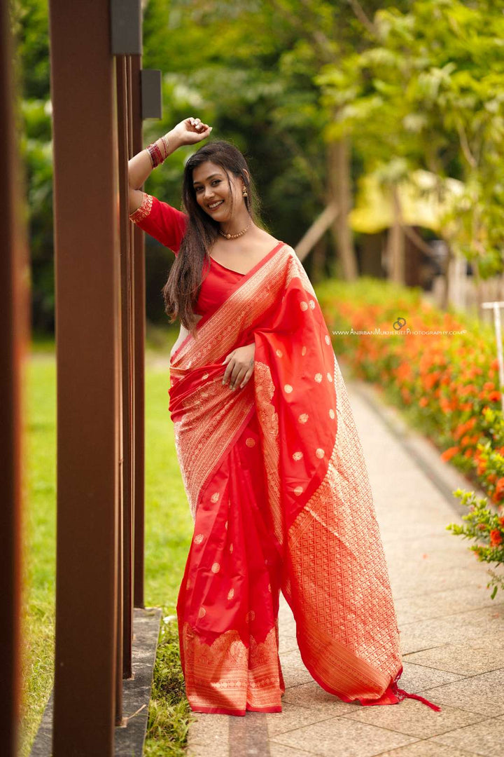 Red Color Polka Print Jacquard Banarasi Saree with Border and Tussel