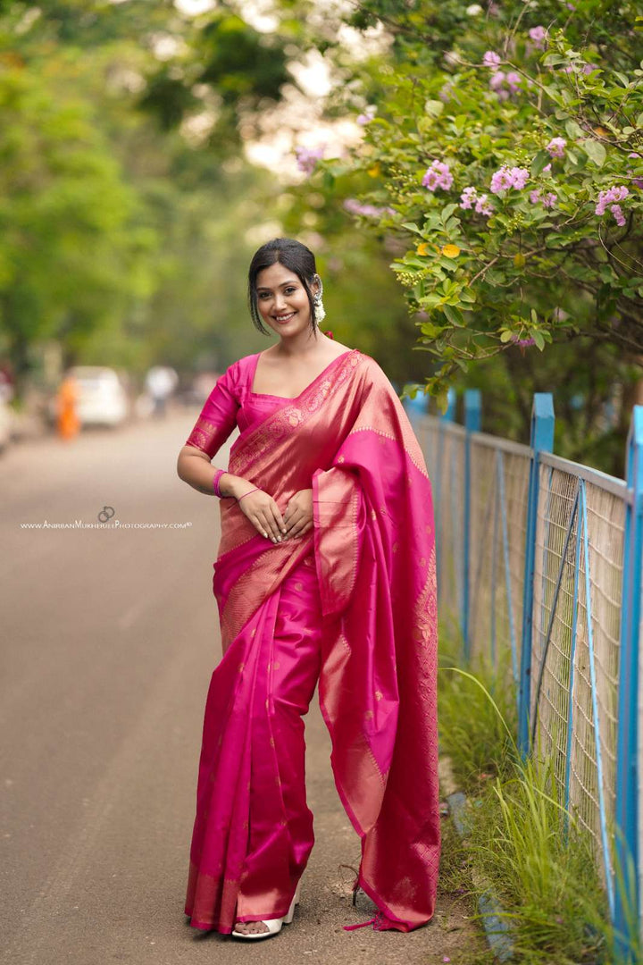 Pink Color Polka Print Jacquard Banarasi Saree with Border and Tussel