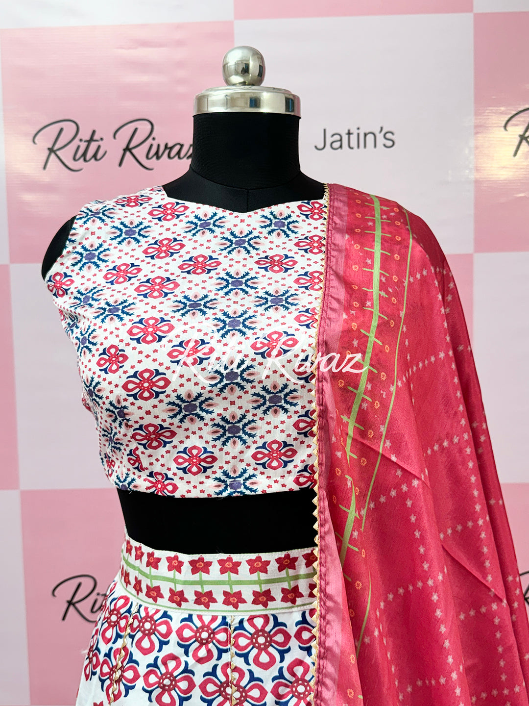 Traditional white color Ready to wear lehenga with unstitched blouse