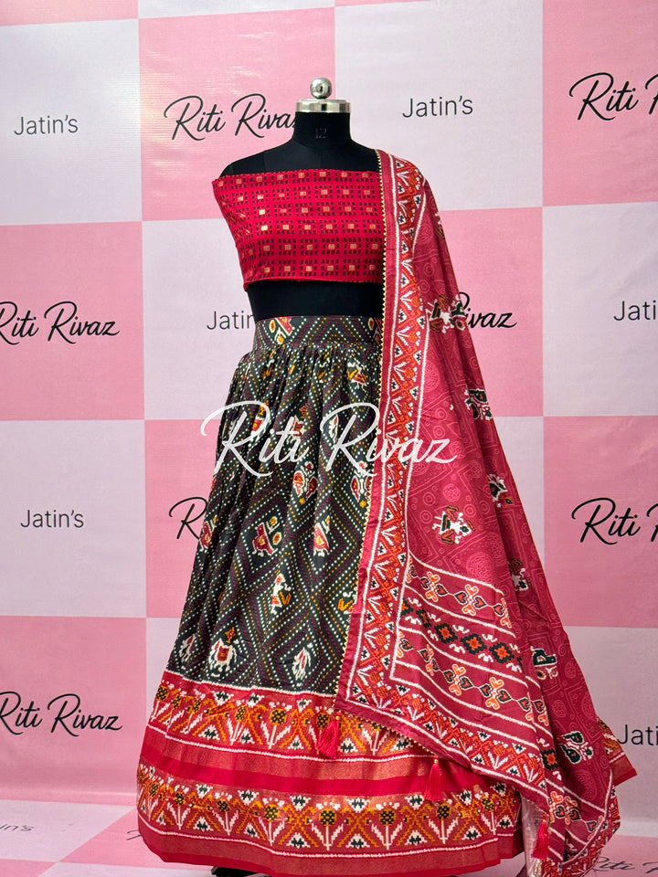 Green color Tussar Silk Patola and Bandhani Print with foil work Fully Lehenga choli