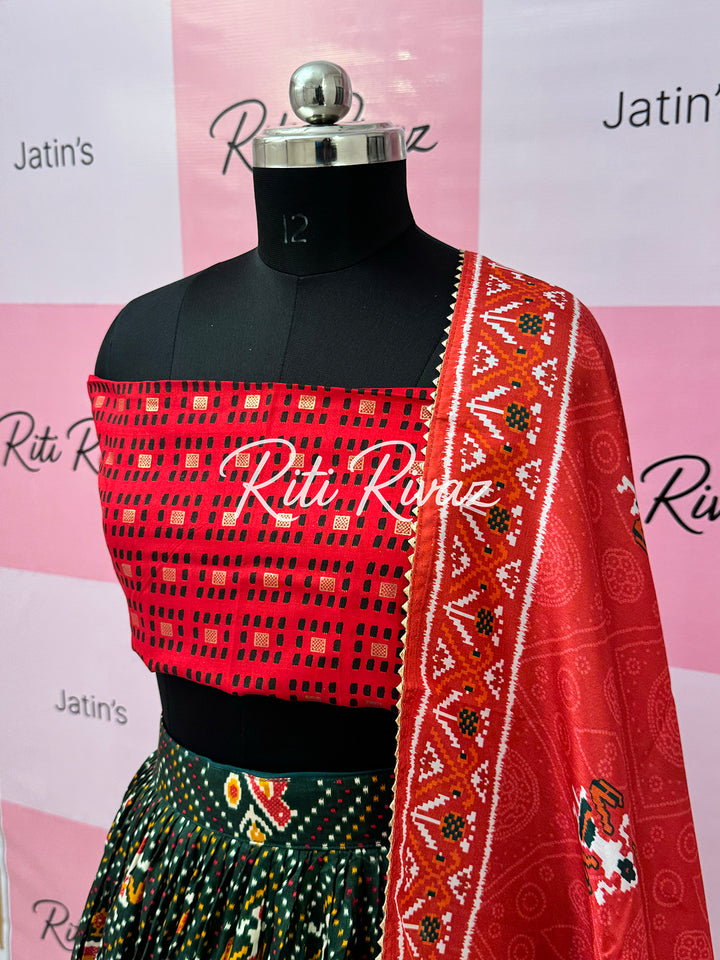 Green color Tussar Silk Patola and Bandhani Print with foil work Fully Lehenga choli